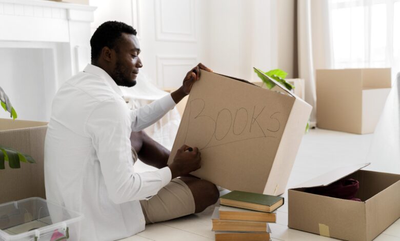 african-american-man-getting-ready-his-new-home-move - مرينا لتجارة اثاث مستعمل